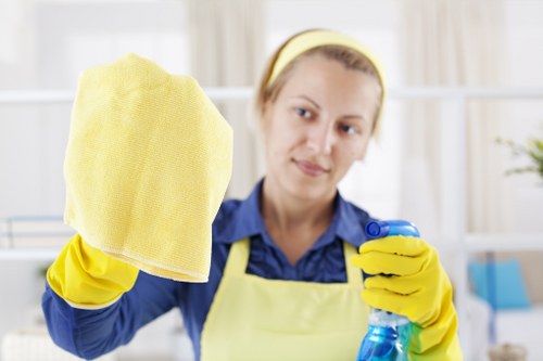 Cleaner canarywharf cleaner preparing safe equipment in a modern office